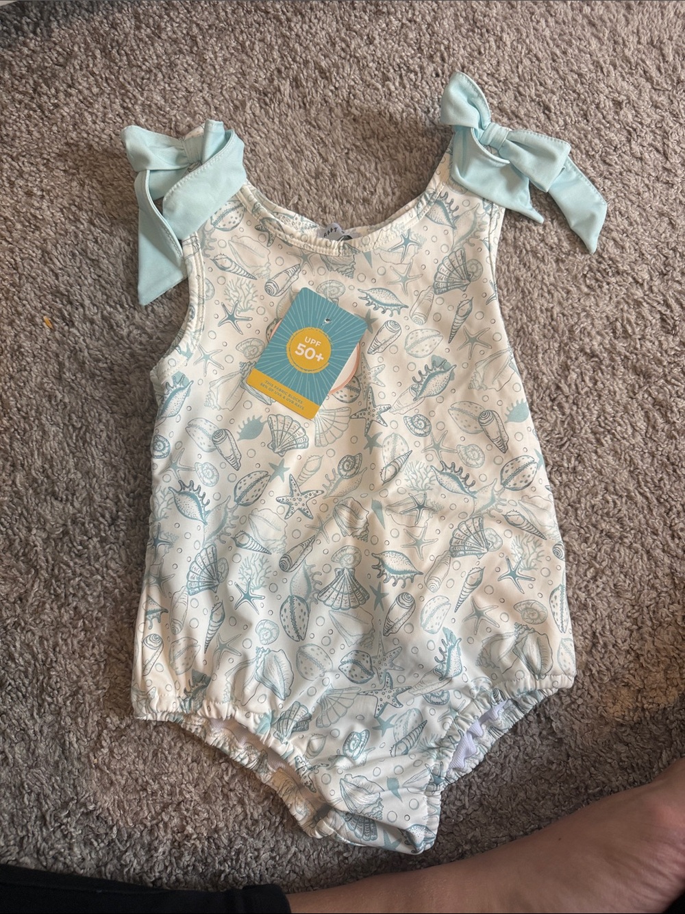 Kids UPF 50+ Sea Shell Print One-Piece Swimsuit with Mint Ties